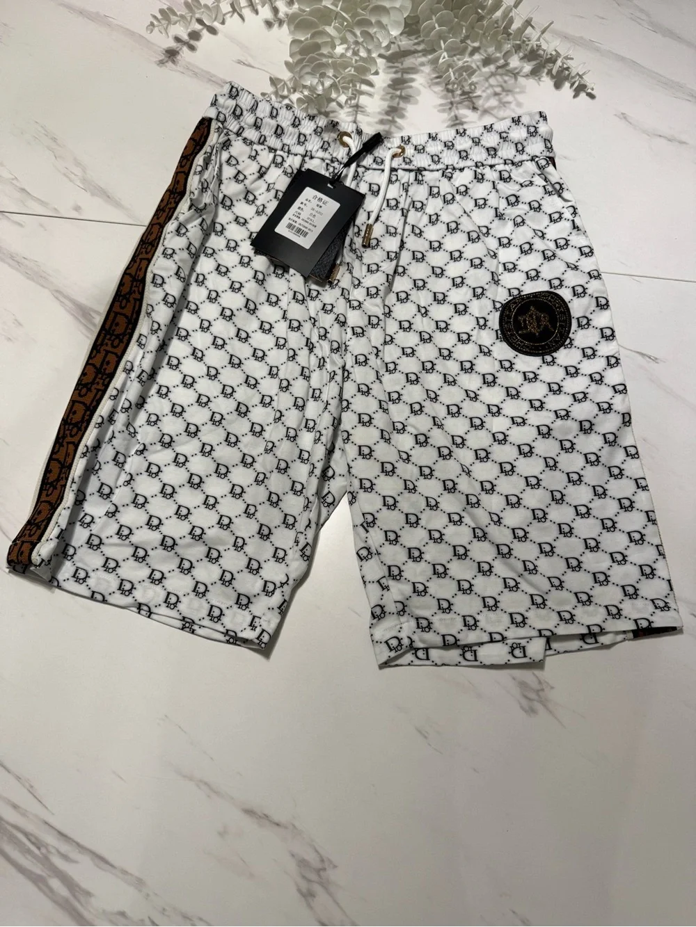 Men's White Patterned Swim Shorts with Brown Trim